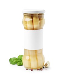 Photo of Pickled asparagus in jar and spices isolated on white