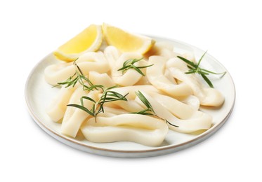 Photo of Uncooked squid rings with lemon slices and rosemary isolated on white