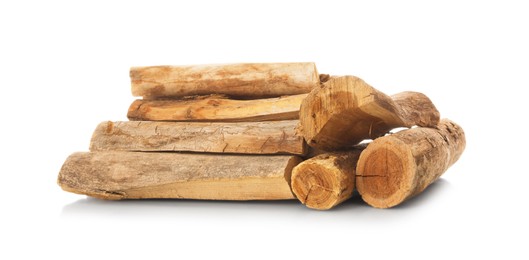 Photo of Pile of cut firewood isolated on white