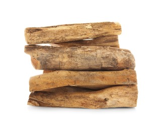 Photo of Pile of cut firewood isolated on white