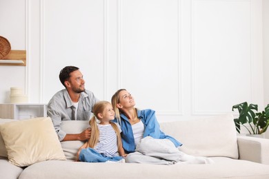 Photo of Happy family spending time together at home. Space for text
