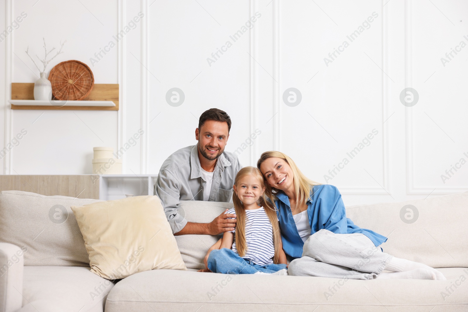 Photo of Happy family spending time together at home. Space for text