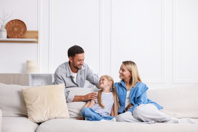 Photo of Happy family spending time together at home