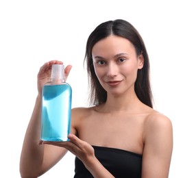 Photo of Young woman with bottle of mouthwash on white background. Oral hygiene