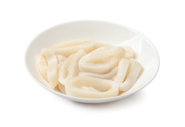 Photo of Uncooked squid rings in bowl isolated on white