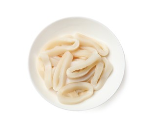 Photo of Uncooked squid rings in bowl isolated on white, top view