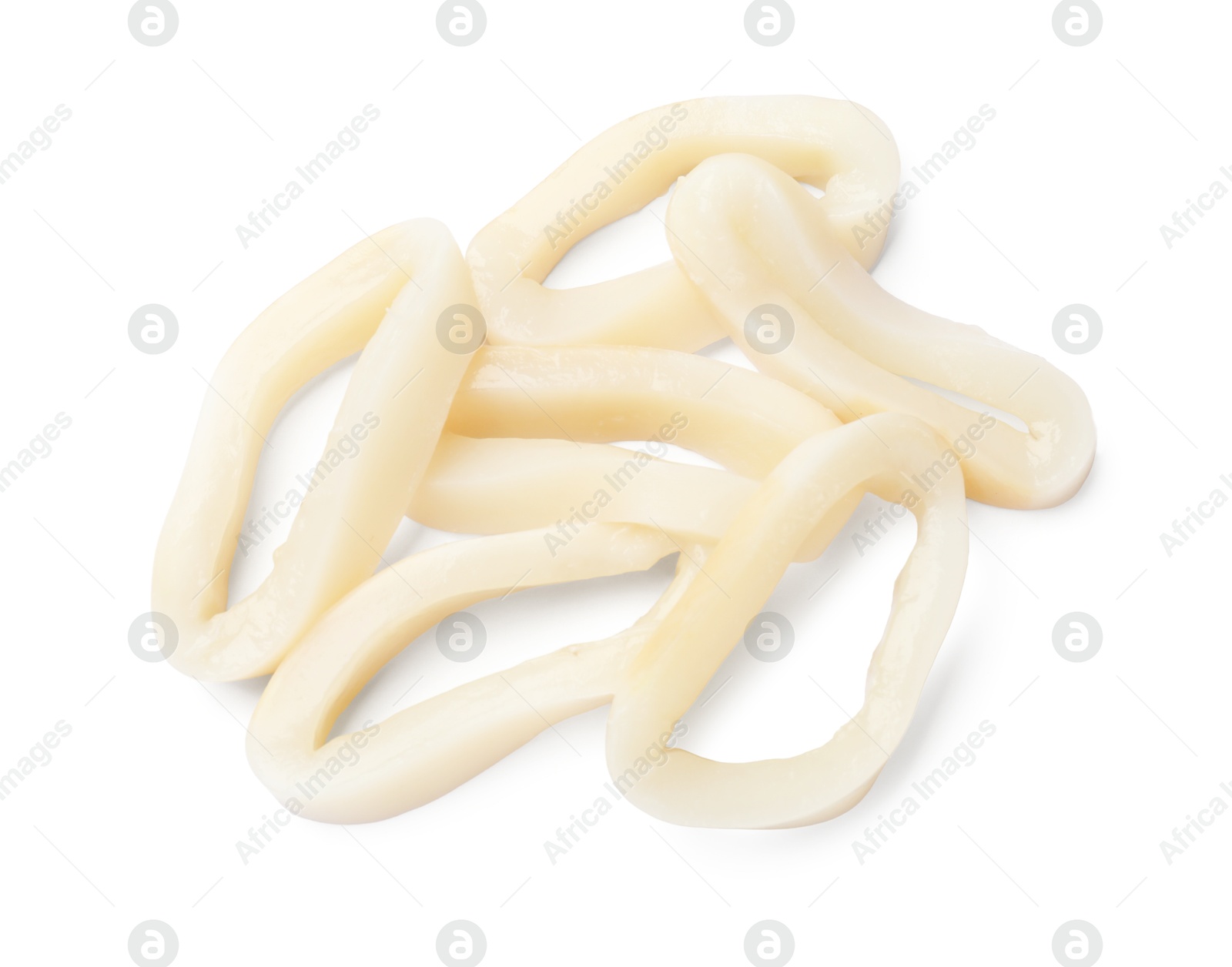 Photo of Many uncooked squid rings isolated on white, top view