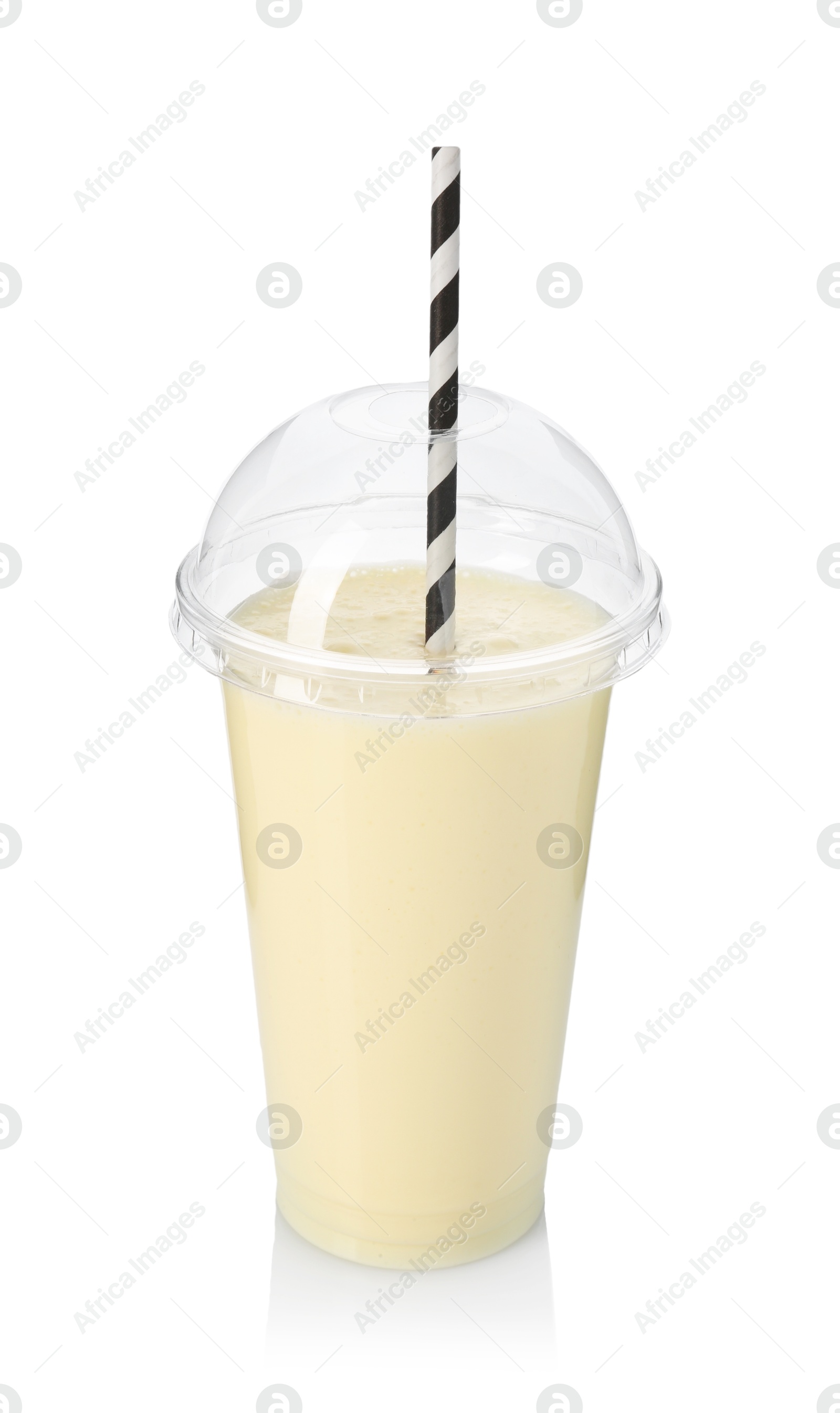 Photo of Tasty milkshake in plastic cup isolated on white