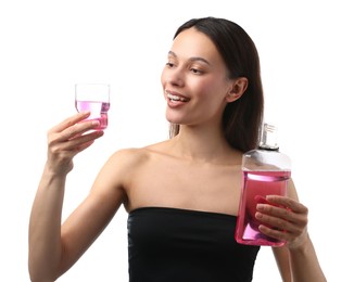 Photo of Smiling young woman with mouthwash isolated on white. Oral hygiene