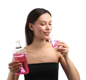 Photo of Young woman rinsing mouth with mouthwash on white background. Oral hygiene