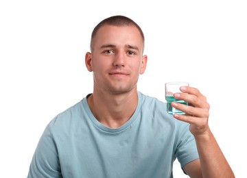 Photo of Man with glass of mouthwash on white background