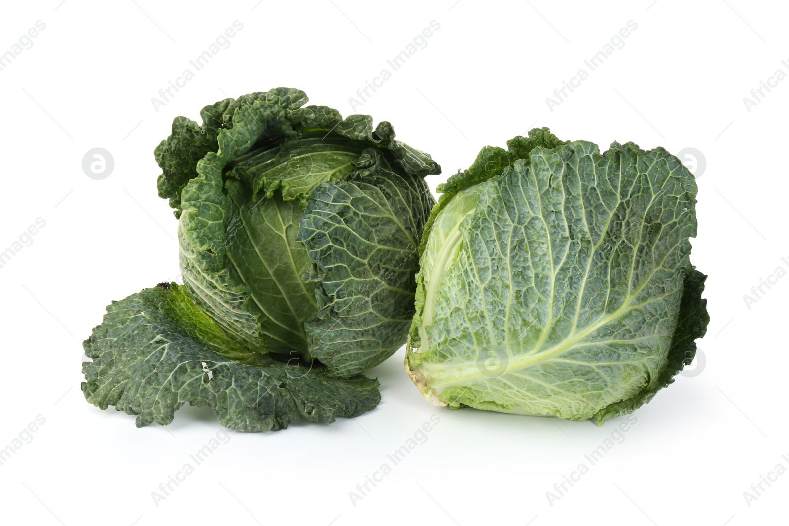 Photo of Fresh ripe Savoy cabbages isolated on white