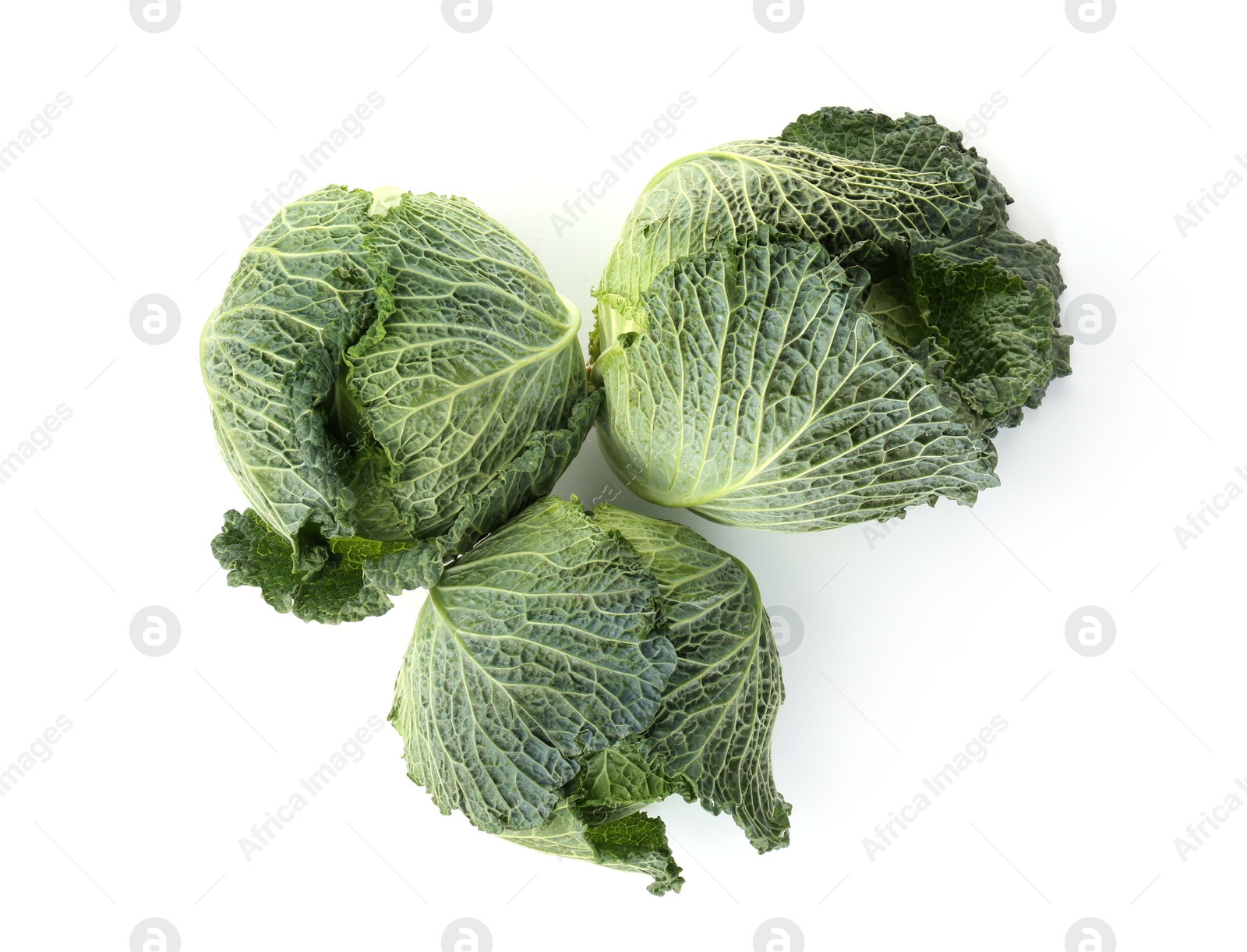 Photo of Fresh ripe Savoy cabbages isolated on white, top view