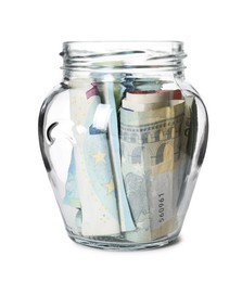 Photo of Glass jar with money isolated on white