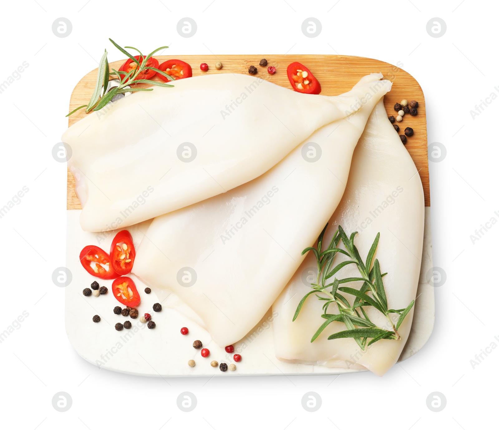 Uncooked squids with spices isolated on white, top view Photo of Uncooked squids with spices isolated on white, top view