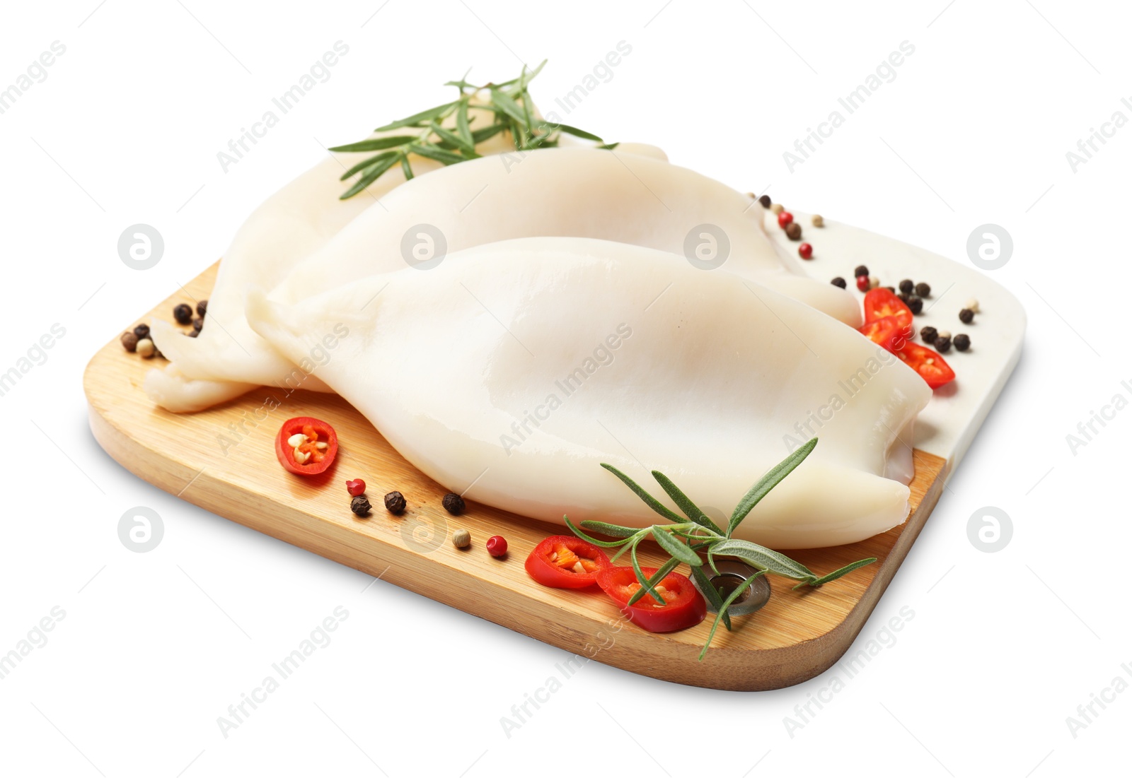 Uncooked squids with spices isolated on white Photo of Uncooked squids with spices isolated on white