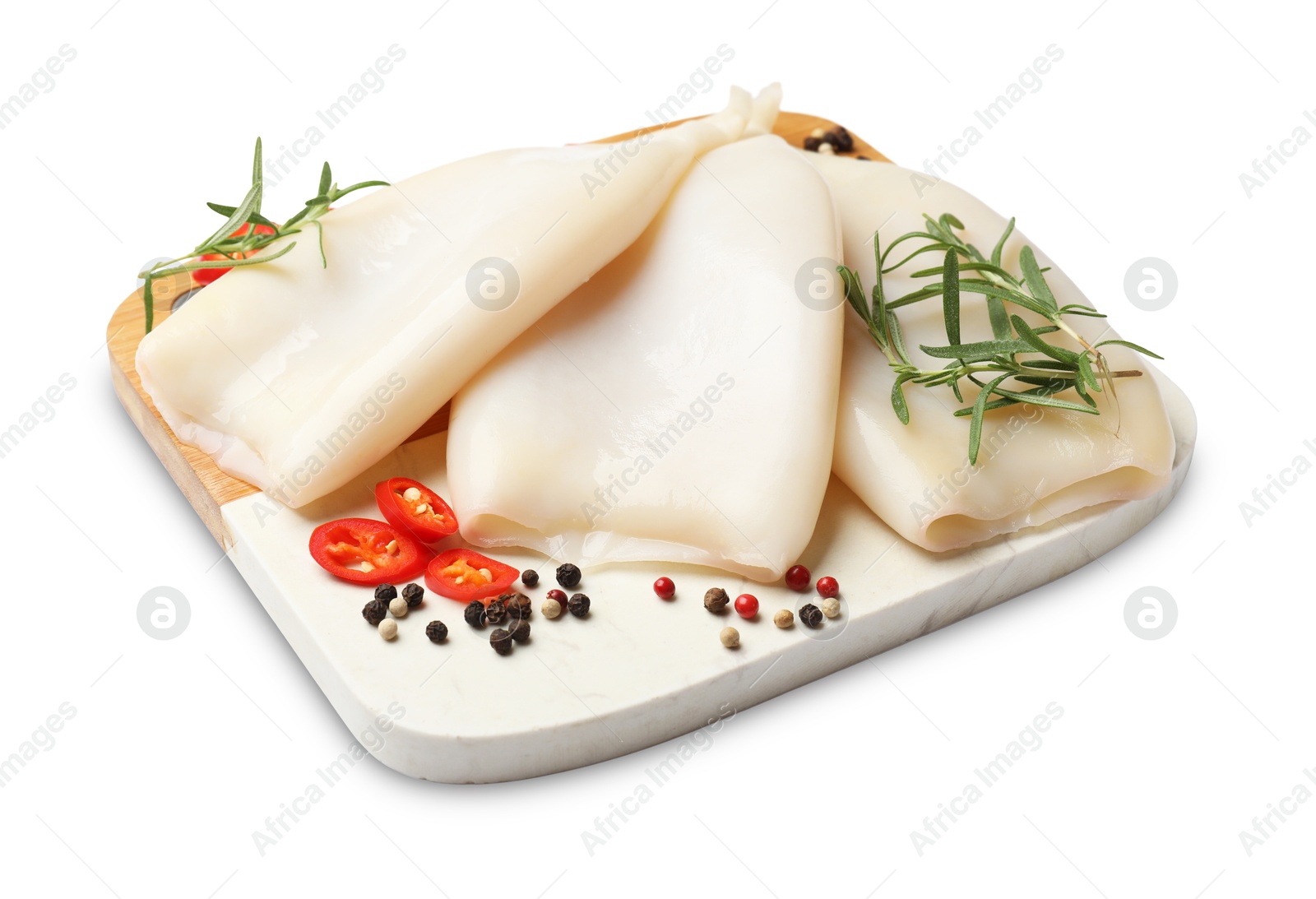 Uncooked squids with spices isolated on white Photo of Uncooked squids with spices isolated on white