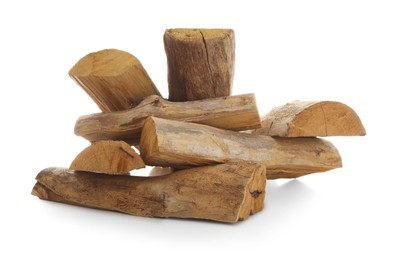 Photo of Pile of cut firewood isolated on white