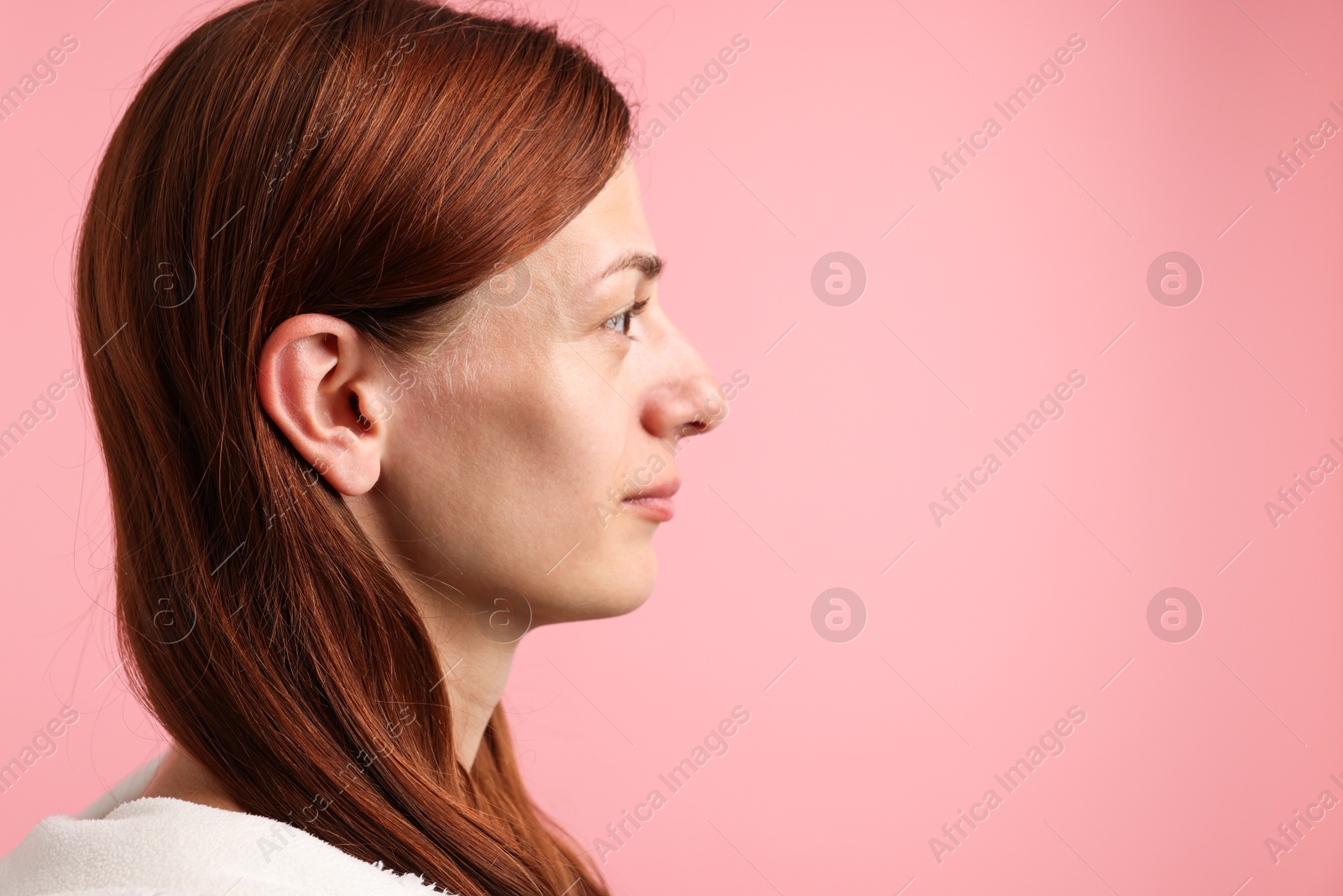 Photo of Sound. Woman on pink background, space for text