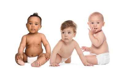 Image of Adorable babies in diapers on white background