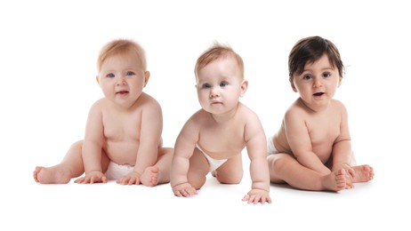 Image of Adorable babies in diapers on white background