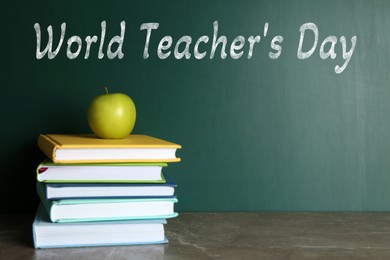 Image of Happy Teacher's Day greeting card with books and text on green chalkboard