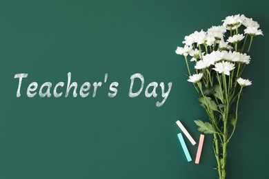 Image of Happy Teacher's Day greeting card with flowers and text on green chalkboard