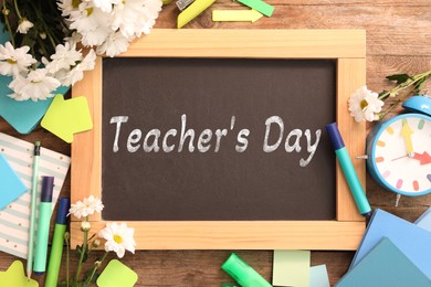 Image of Happy Teacher's Day greeting card with flowers and text on small chalkboard