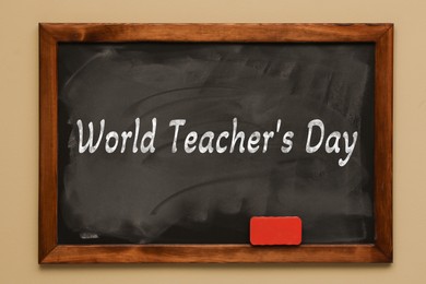 Image of Happy Teacher's Day greeting card. Text on blackboard