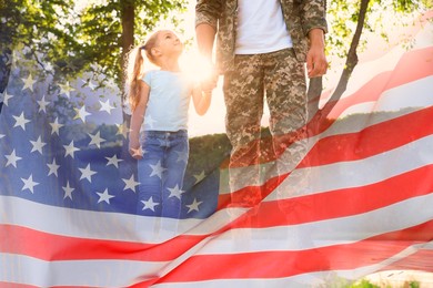 Image of Military man and his daughter outdoors, double exposure with national flag of USA