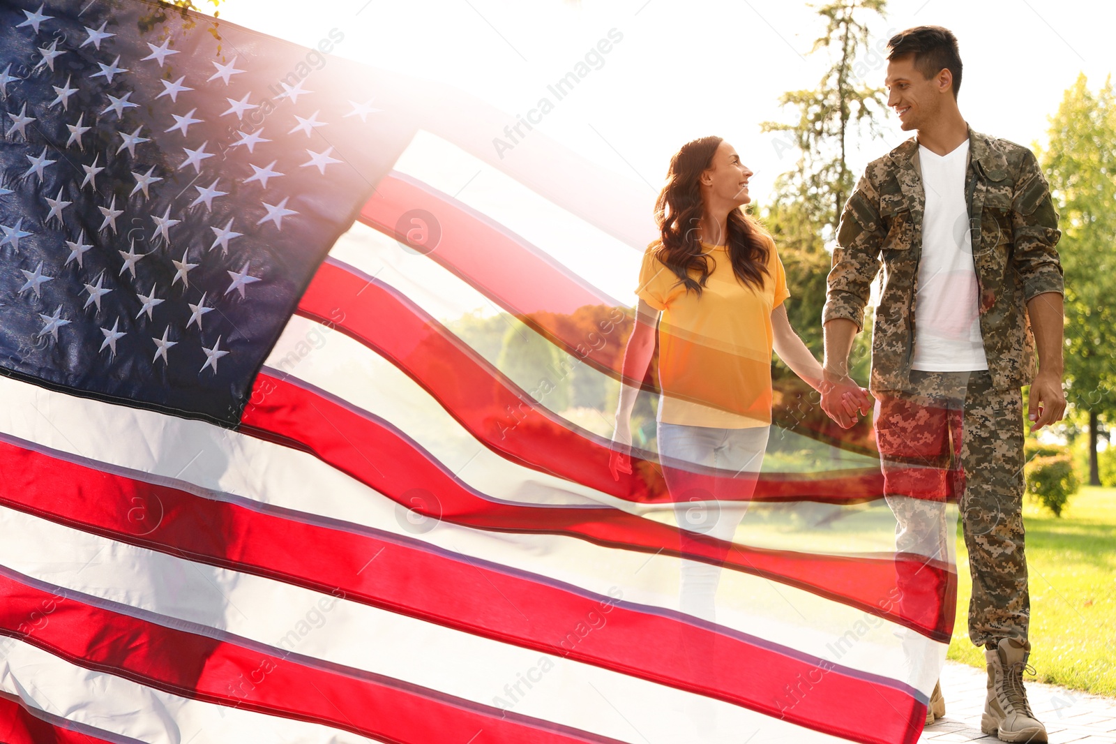 Image of Military man and his girlfriend outdoors, double exposure with national flag of USA