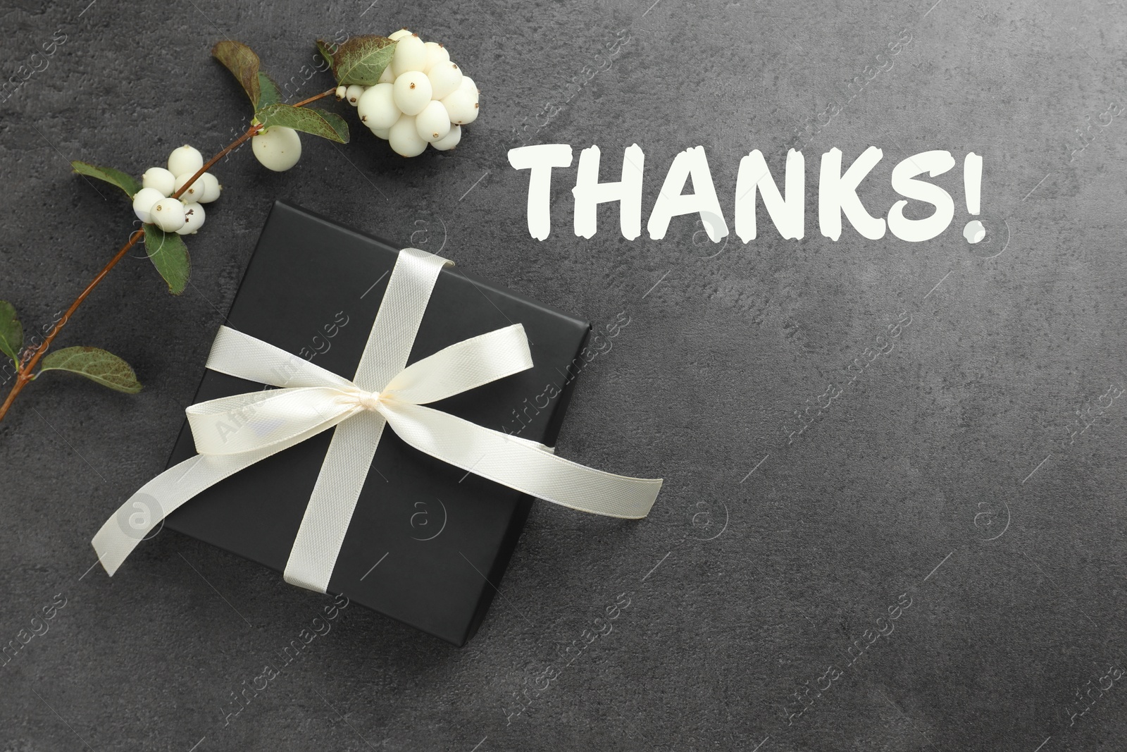 Image of Thank you card design with gift box and flower on grey background