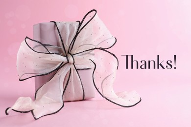 Image of Thank you card design with gift box on pink background
