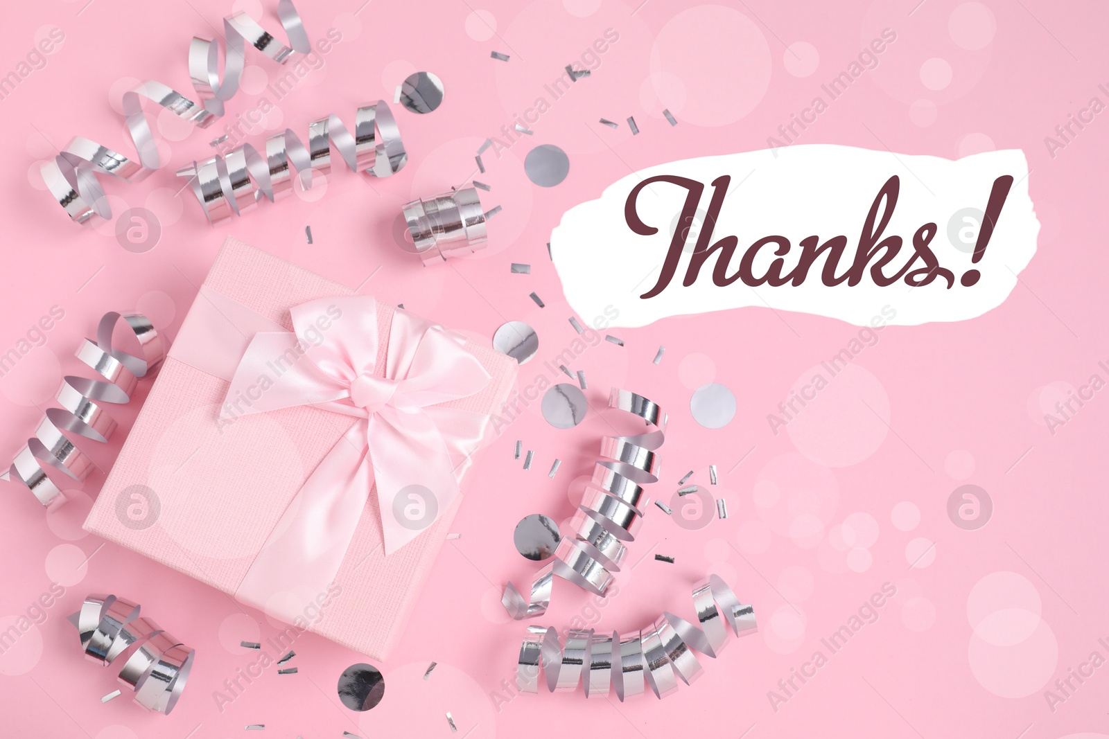 Image of Thank you card design with gift box, serpentine streamers and confetti on pink background. Bokeh effect