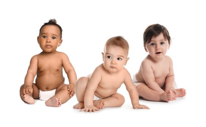 Image of Adorable babies in diapers on white background