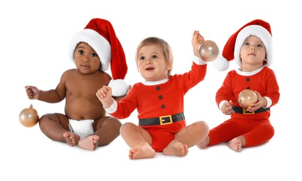Image of Cute babies in Christmas clothes on white background