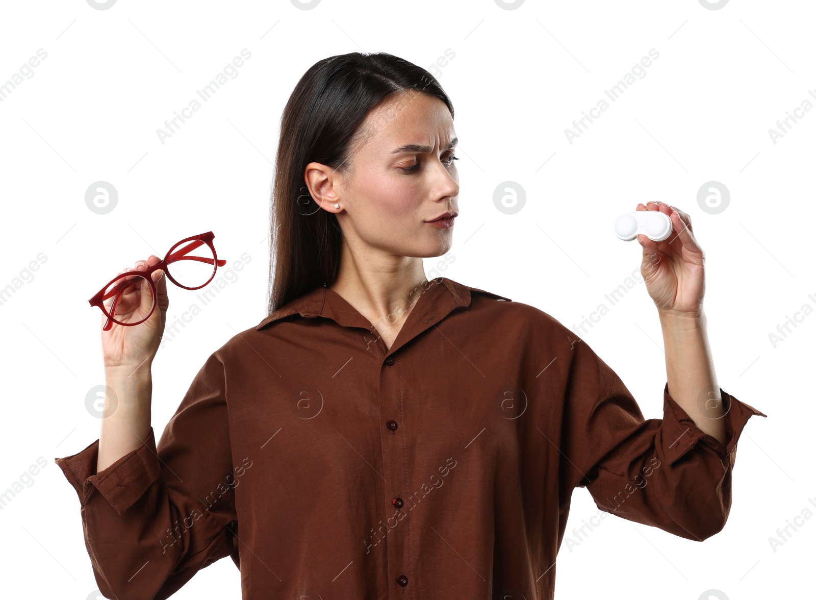 Photo of Woman choosing between glasses and contact lenses on white background