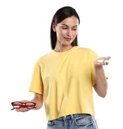 Photo of Woman choosing between glasses and contact lenses on white background