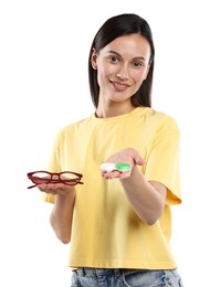 Photo of Woman choosing between glasses and contact lenses on white background