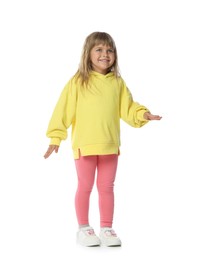 Photo of Happy little girl dancing on white background