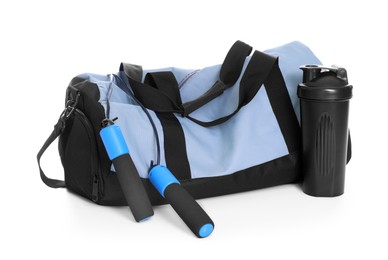Photo of Stylish bag with sports equipment isolated on white