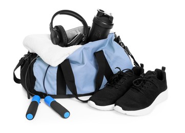 Photo of Stylish bag with sports equipment isolated on white