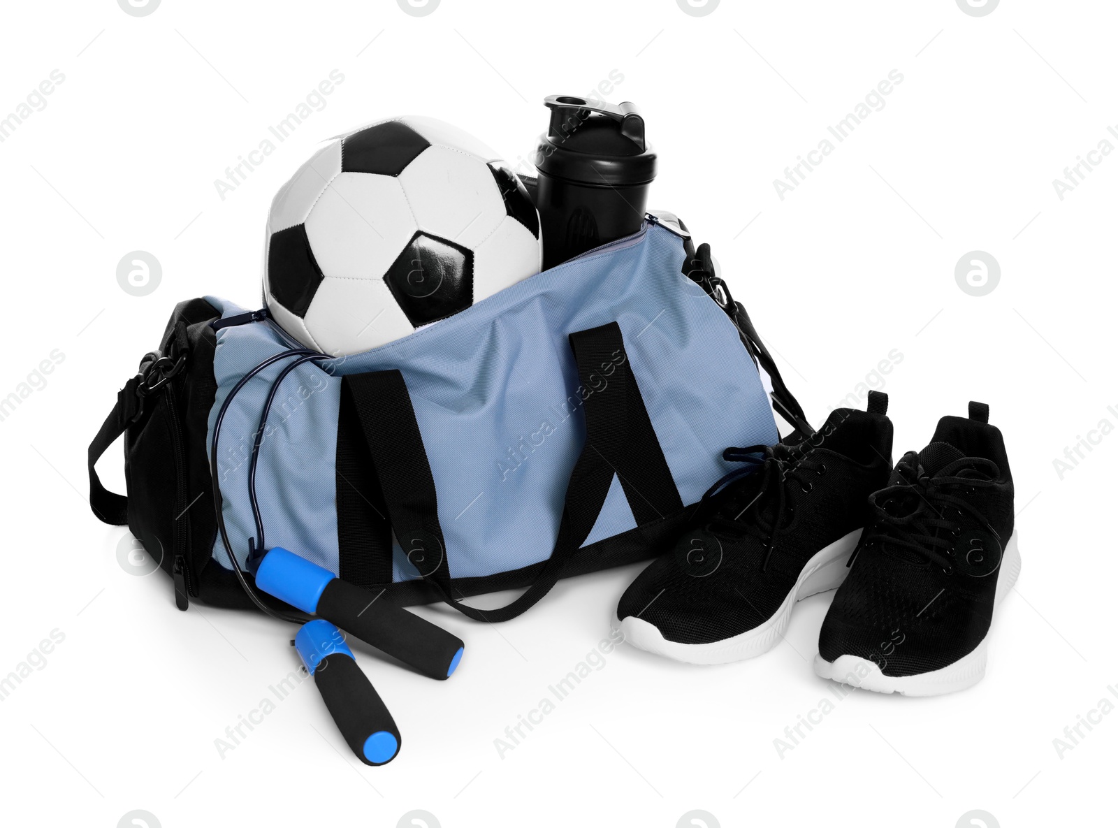 Photo of Stylish bag with sports equipment isolated on white