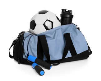 Photo of Stylish bag with sports equipment isolated on white
