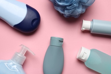 Photo of Baby bath necessities on pink background, flat lay