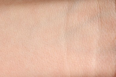 Photo of Human skin, closeup view. Detailed texture of surface