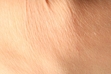 Photo of Human skin, closeup view. Detailed texture of surface