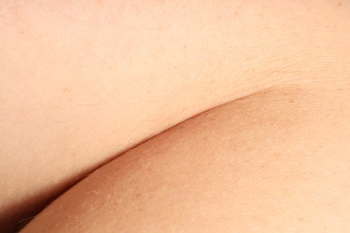 Photo of Human skin, closeup view. Detailed texture of surface