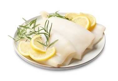 Photo of Pieces of raw squids with rosemary and lemon isolated on white
