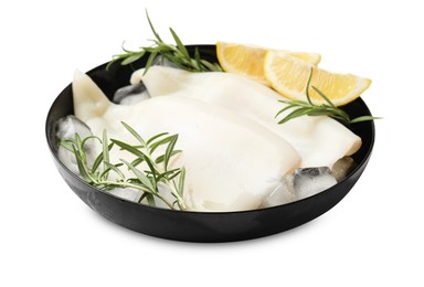 Photo of Pieces of raw squids with ice cubes, lemon and rosemary isolated on white